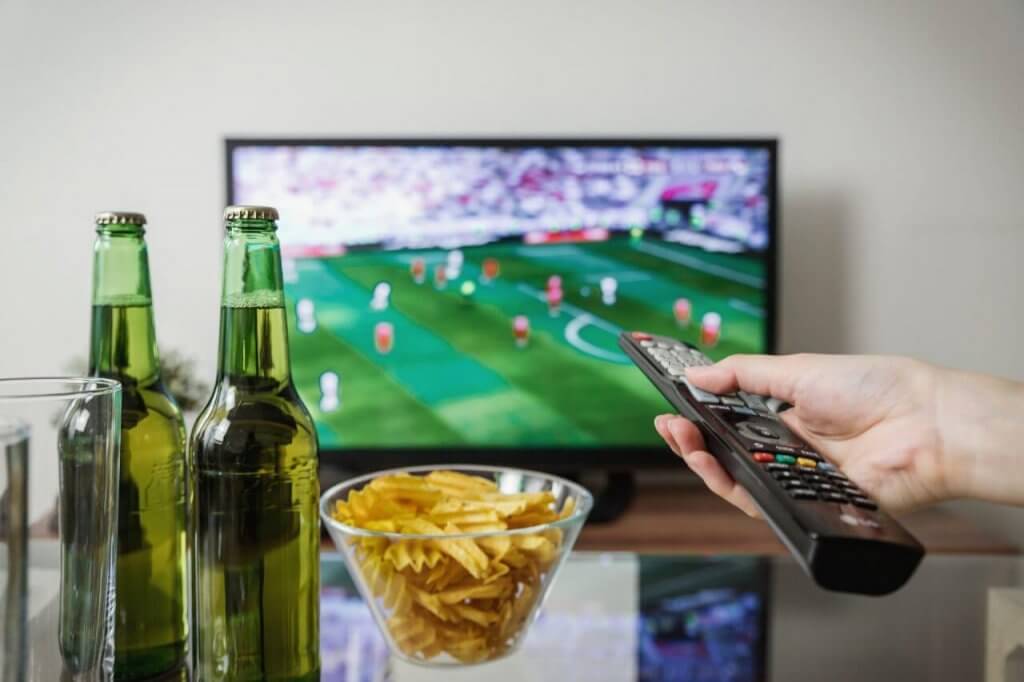 Football on tv with snacks